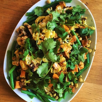 Warm salad of roasted cauliflower, sweet potato and chickpeas with spiced beef crumble