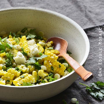 Mexican-Inspired Warm Garlic Butter Corn Salad with Cotija