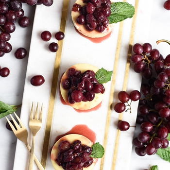 Mini Cheesecakes with Champagne Roasted Grapes
